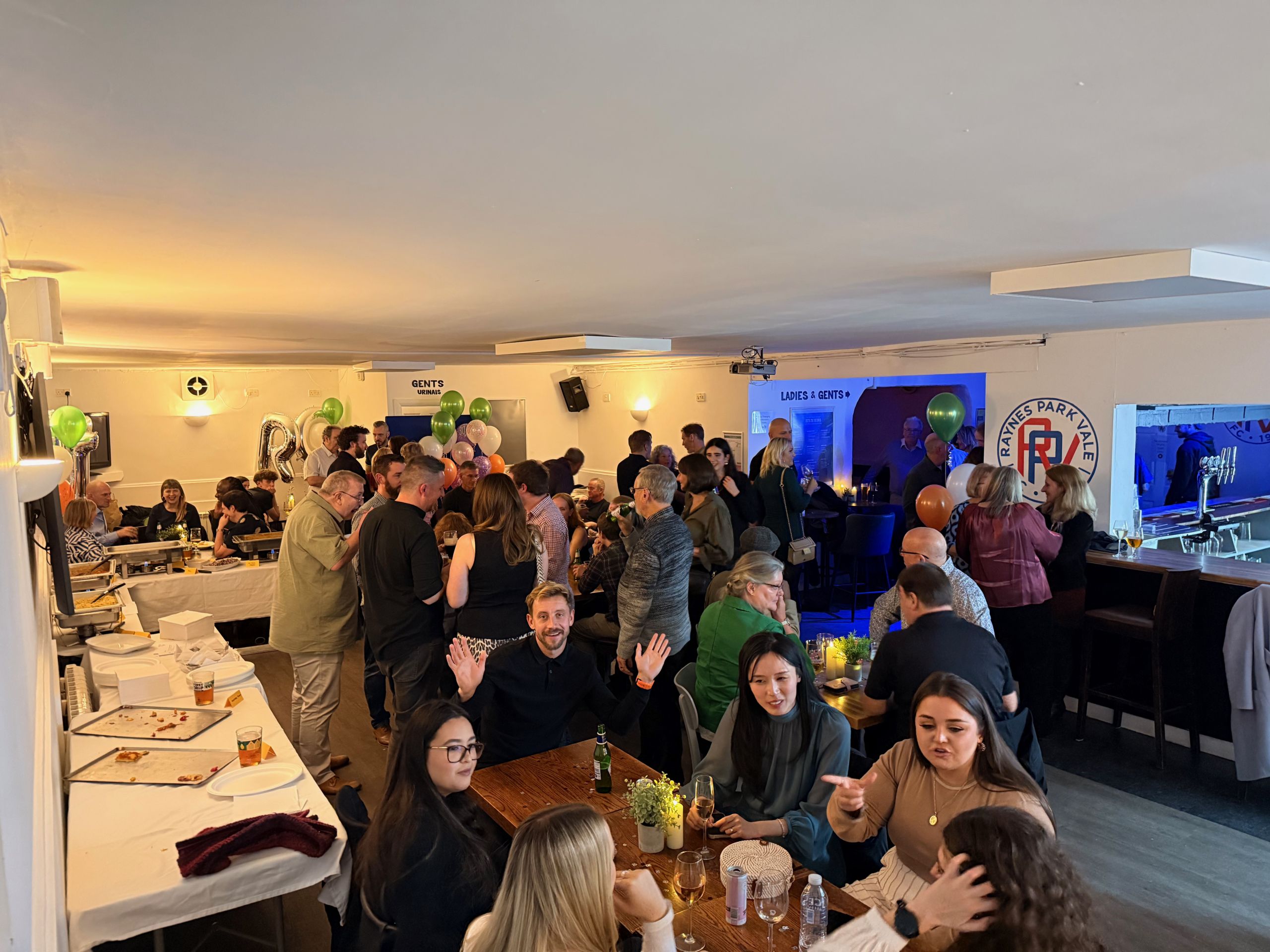 Guests enjoying an event at The Vale Clubhouse